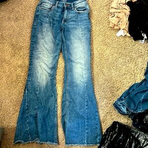 Denim blue flare jeans high-rise.